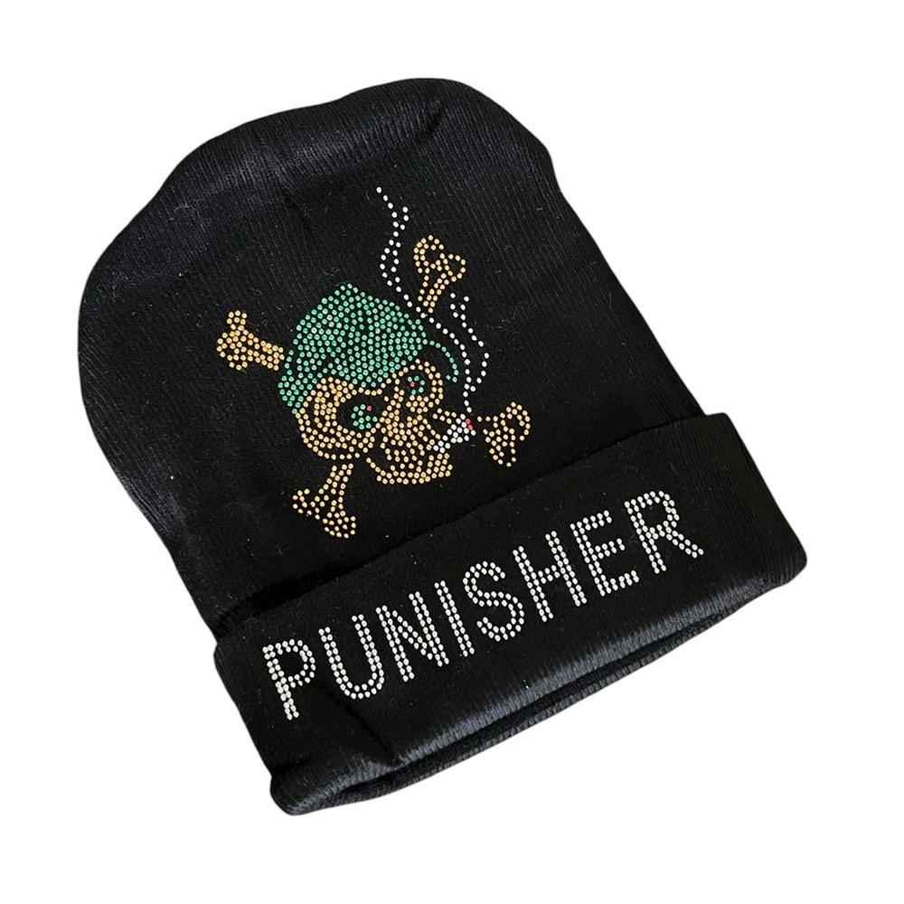 black knitted beanie hat with a studded Punisher skull logo